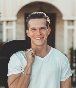 man-in-white-v-neck-t-shirt-and-black-pants-775358